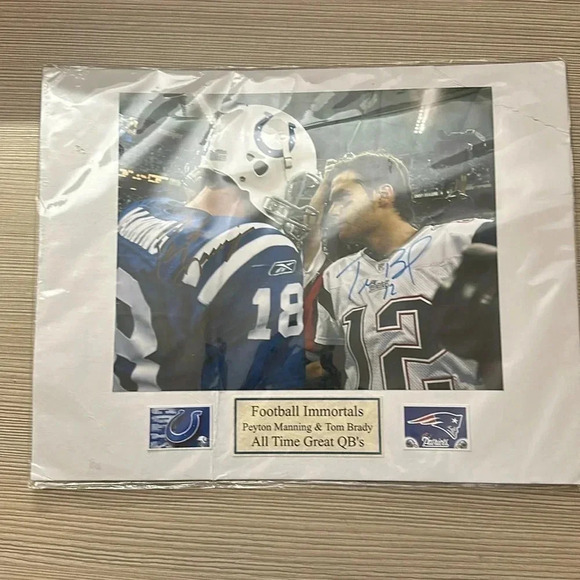 - TomBrady Peyton Manning autographed 8 x 10 photo